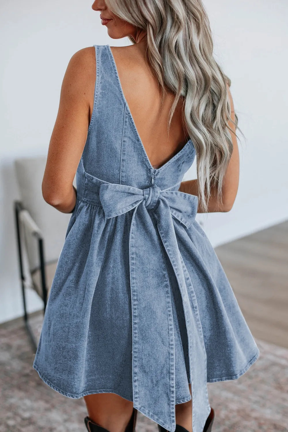 Explore More Collection - V-Back Bow Tie Denim Skater Dress - Lizzie's Boutique Explore More Collection - V-Back Bow Tie Denim Skater Dress - Lizzie's Boutique