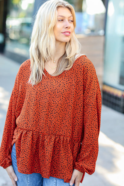 Explore More Collection - Feeling Bold Rust Leopard Print V Neck Peplum Top