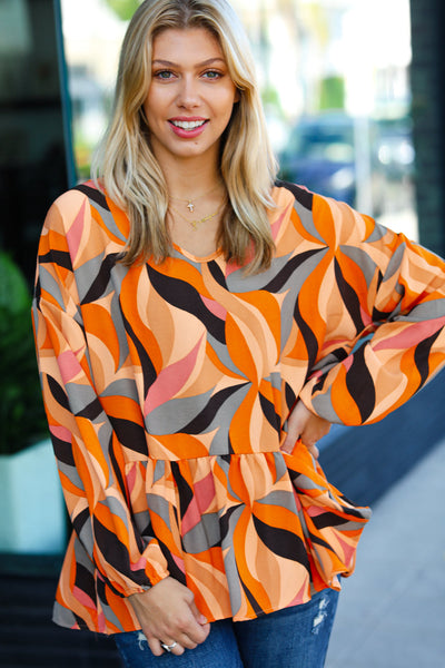Explore More Collection - In My Thoughts Rust Abstract V Neck Peplum Top