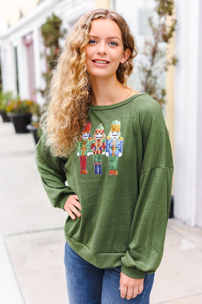 Explore More Collection - Be Merry Forest Green Nutcracker Sequin Hacci Top