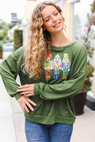 Explore More Collection - Be Merry Forest Green Nutcracker Sequin Hacci Top