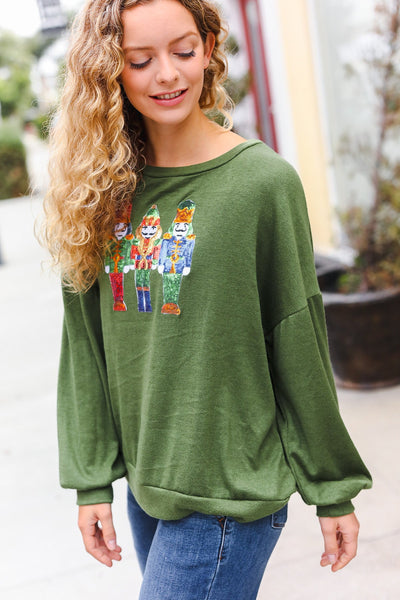 Explore More Collection - Be Merry Forest Green Nutcracker Sequin Hacci Top