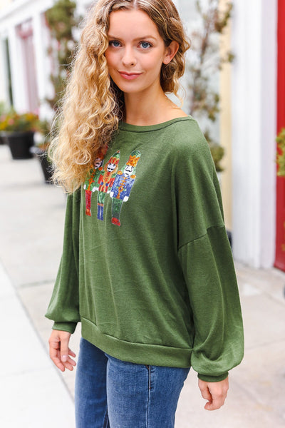 Explore More Collection - Be Merry Forest Green Nutcracker Sequin Hacci Top