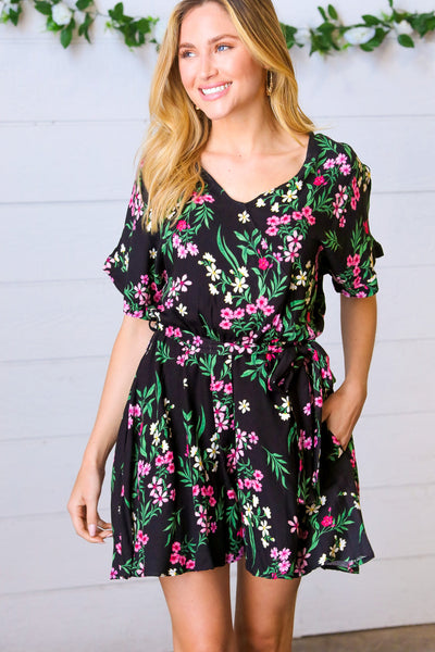 Explore More Collection - Black & Floral Surplice Short Sleeve Pocketed Romper