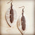 Explore More Collection - Leather Oval Earrings in Hair with Copper Feather