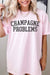 Explore More Collection - CHAMPAGNE PROBLEMS GRAPHIC TEE