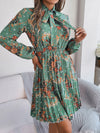 Explore More Collection - Pleated Printed Tie Neck Long Sleeve Dress