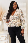 Explore More Doorbusters - Honey Printed Tied Plunge Peplum Blouse