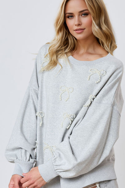 Explore More Collection - Pearl Bow Round Neck Dropped Shoulder Sweatshirt