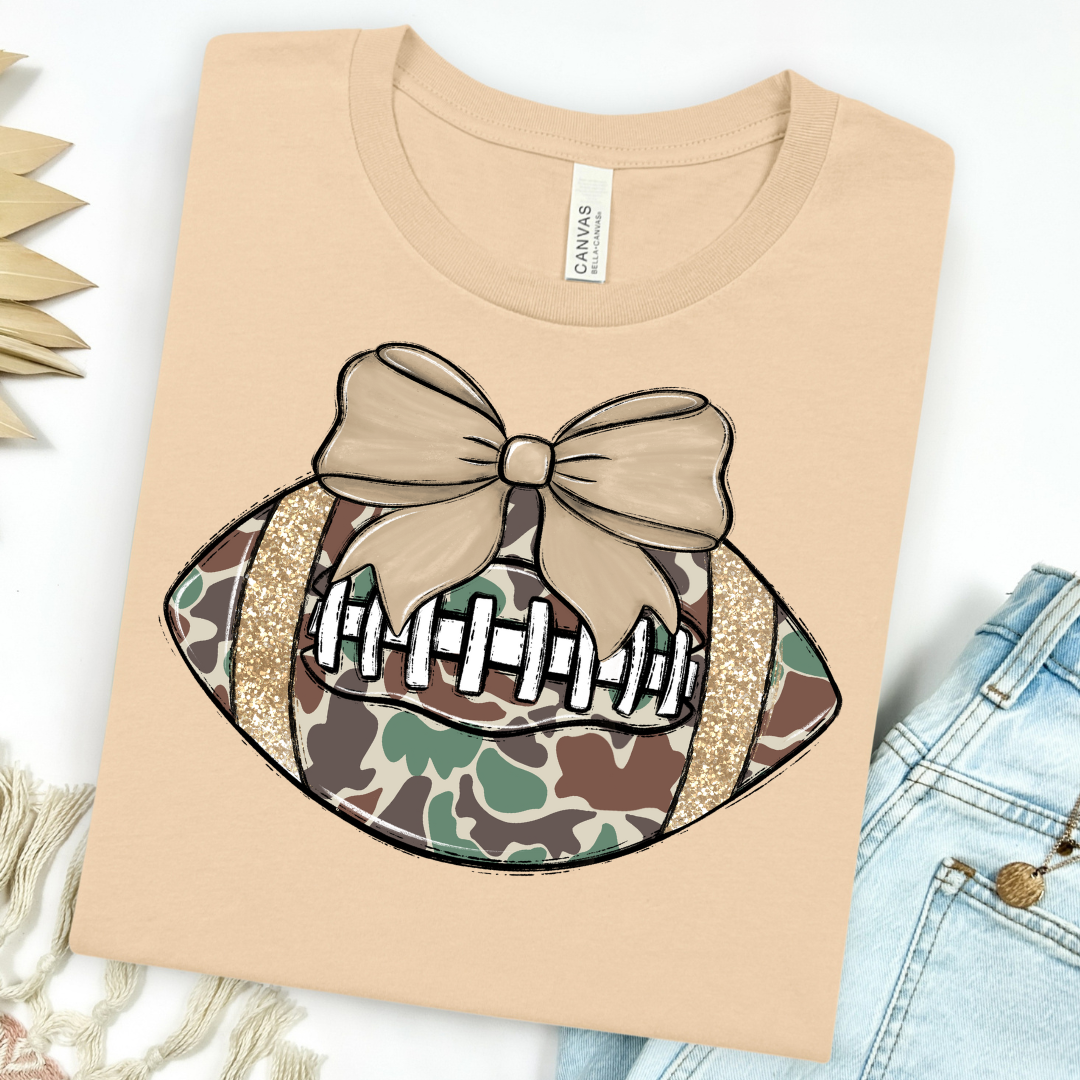 Explore More Collection - Camo Football with Bow Graphic Tee