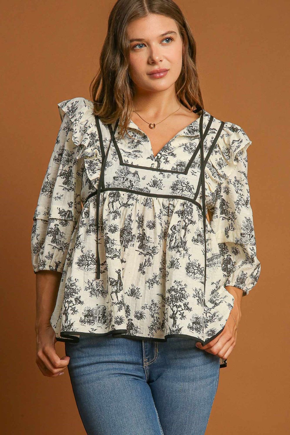 Explore More Collection - Umgee Ruffled Tie Neck Puff Sleeve Babydoll Blouse