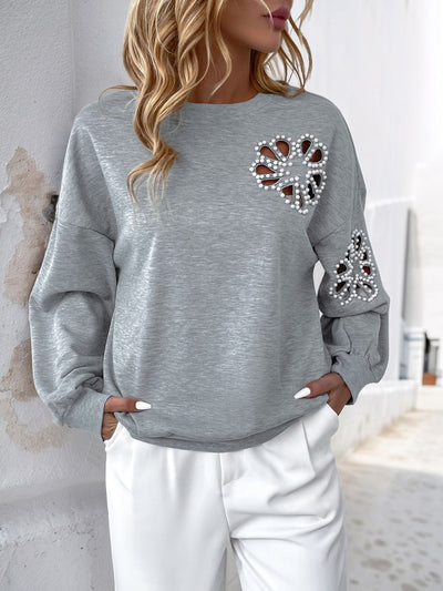 Explore More Collection - Perfee Cutout Pearl Round Neck Long Sleeve Sweatshirt