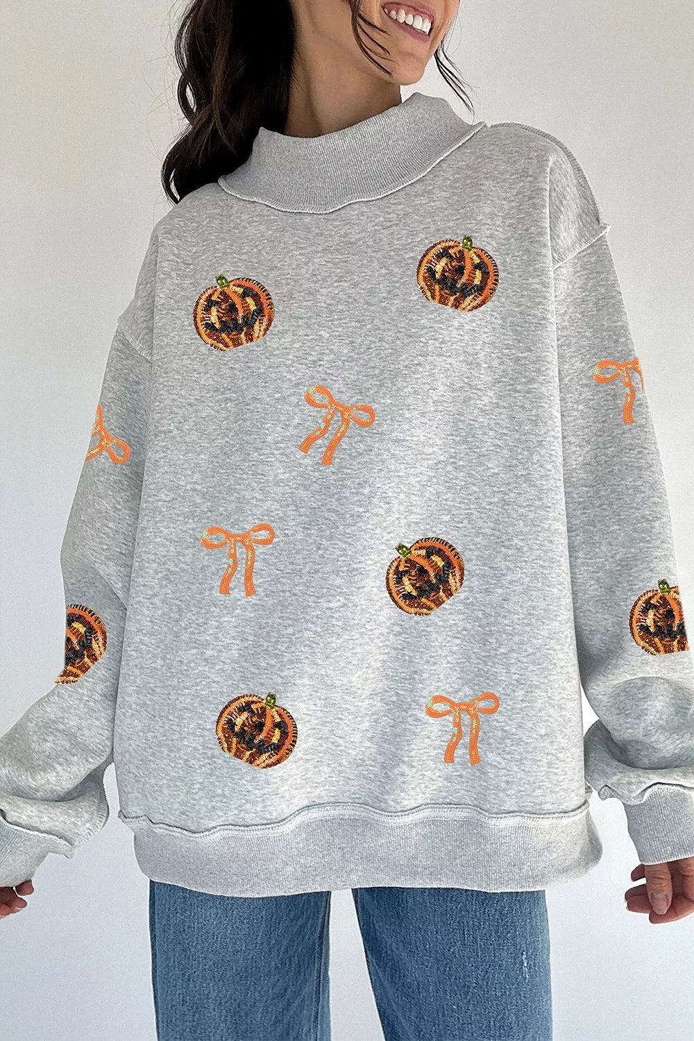 Sequin Pumpkin Face Bow Exposed Seam Halloween Sweatshirt