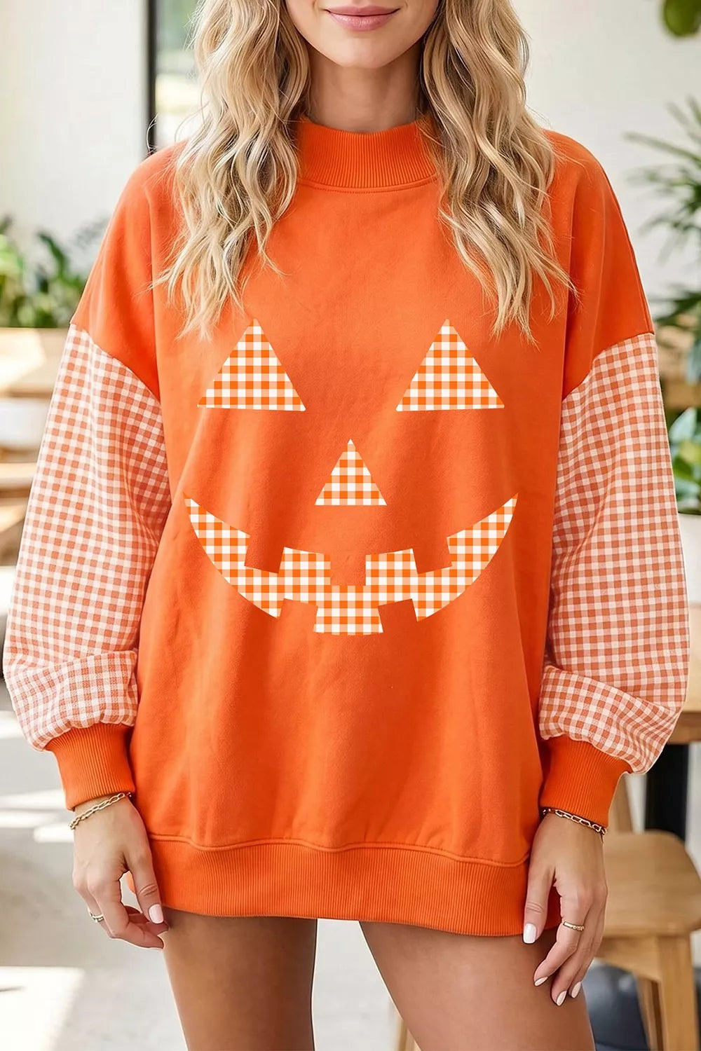 Plaid Sleeve Halloween Pumpkin Face Graphic Sweatshirt
