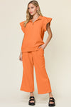 Explore More Collection - Double Take Texture Ruffle Short Sleeve Top and Drawstring Wide Leg Pants Set