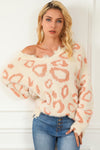 Explore More Collection - Distressed Trim Leopard V-Neck Sweater