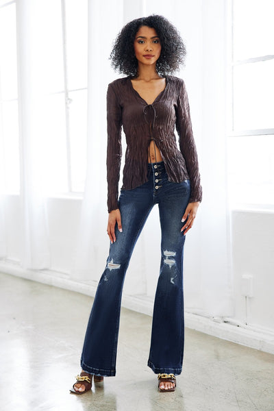 Cassidy - A Pair of Mid Rise Button Up Distress Flare Jeans