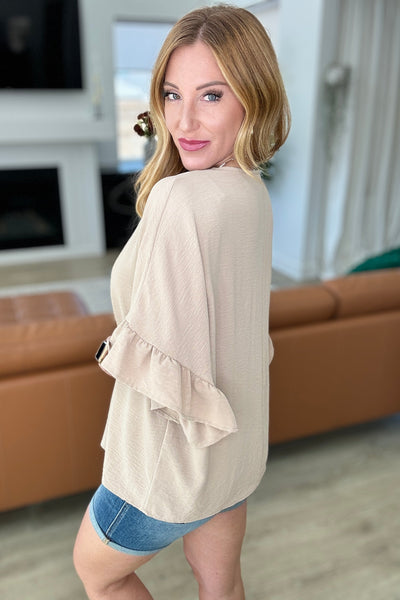 Explore More Collection - Airflow Peplum Ruffle Sleeve Top in Taupe