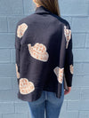 Kara - A Cheetah Patch Print Long Sleeve Sweater