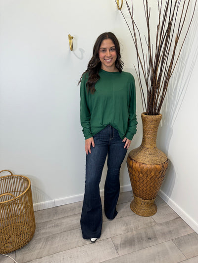 Janet - A Pair of High Waisted Raw Hem Jeans