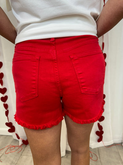 Simon - A Pair of Mid Rise Dyed Frayed Hem Shorts