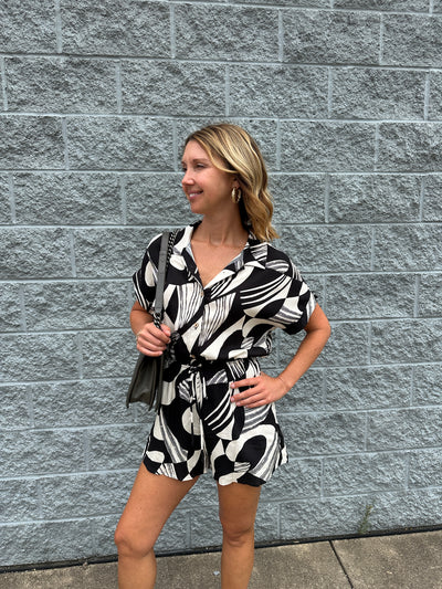 Rena - A Roll Up Sleeve Button Down Abstract Print Romper