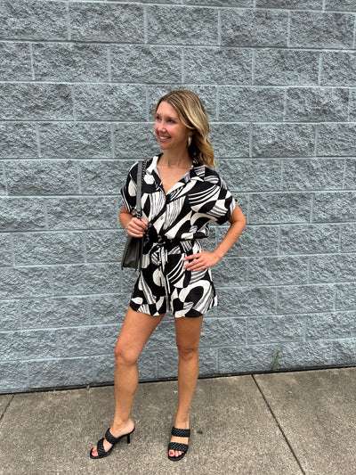 Rena - A Roll Up Sleeve Button Down Abstract Print Romper