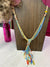 Tru - A Long Braided Necklace with a Tassel