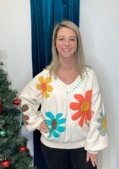 Poise - A Long Sleeve Flower Applique’ Sweater