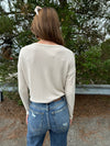 Shelly - A Long Sleeve V-Neck Button Down Self Tie Top