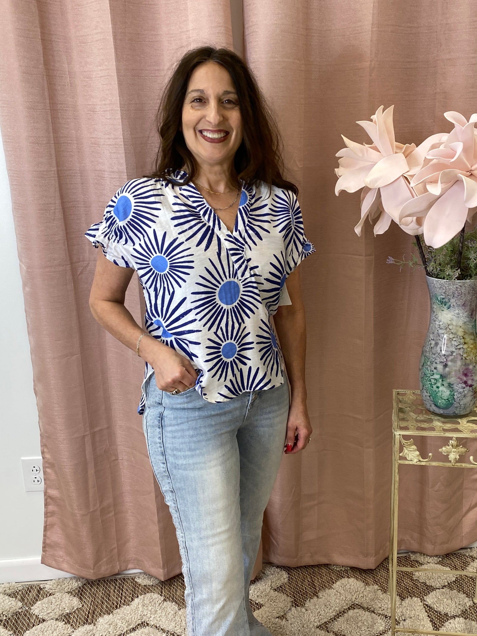 Sunburst - A Sunburst Printed V-Neck Top with Smocked Sleeve Detail