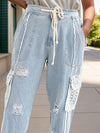 Explore More Collection - Crochet Pocketed Distressed Drawstring Jeans