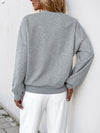 Explore More Collection - Perfee Cutout Pearl Round Neck Long Sleeve Sweatshirt