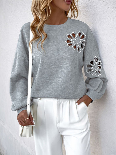 Explore More Collection - Perfee Cutout Pearl Round Neck Long Sleeve Sweatshirt