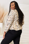 Explore More Doorbusters - Honey Printed Tied Plunge Peplum Blouse