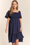 Explore More Collection - J.NNA Smocked Bow Back Ruffle Hem Dress