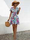 Explore More Collection - Printed Surplice Tie Waist Mini Dress