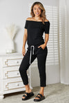 Explore More Collection - Double Take Asymmetrical Neck Tied Jumpsuit with Pockets