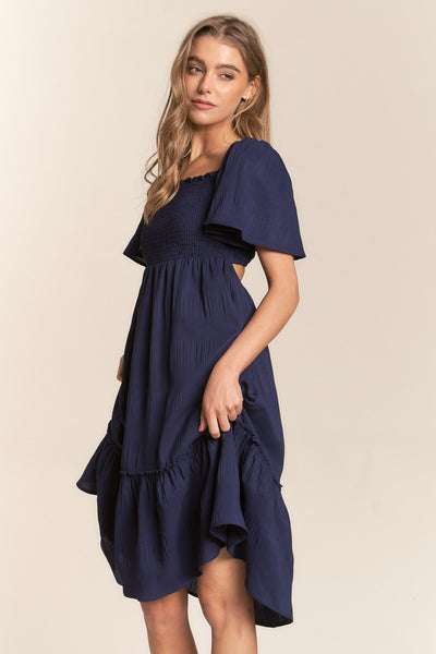 Explore More Collection - J.NNA Smocked Bow Back Ruffle Hem Dress