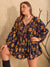 Explore More Collection - Plus Size Floral Tie Neck Balloon Sleeve Romper