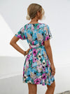 Explore More Collection - Printed Surplice Tie Waist Mini Dress